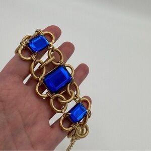 Nolan Miller Gold Bracelet with Vibrant Blue Accents